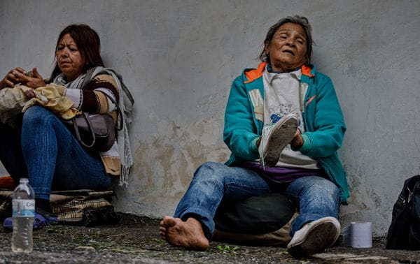 Eva Alfaro Aldana stuffs her worn-out sneakers with toilet paper because they are too big
